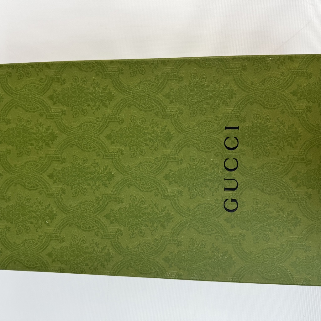 Мюли с монограммой Guccio Gucci