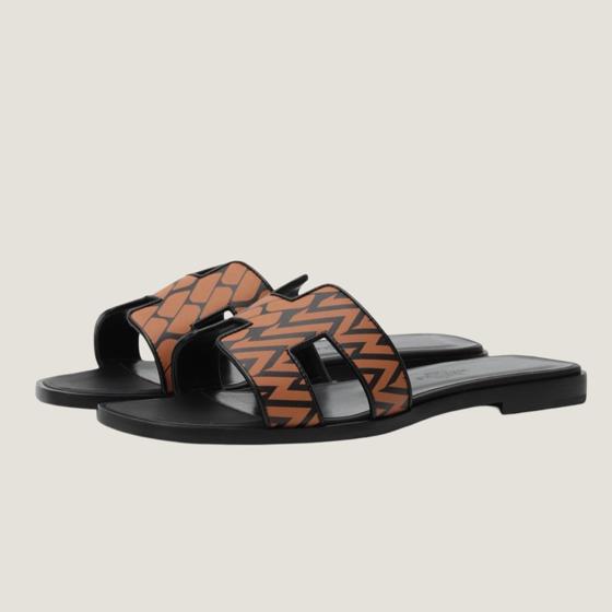 Шлепанцы Oran Black Gold  HERMES