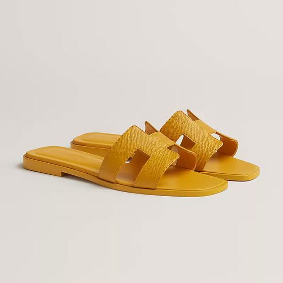 Шлепанцы Oran из кожи Epsom в цвете Topaz Yellow  HERMES